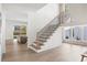 Grand entryway with staircase, natural light, and open floor plan at 48 25Th St, Atlanta, GA 30309