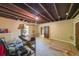 Unfinished basement with exposed ceiling, open ductwork, and potential for customization at 1050 Dunedin Trl, Woodstock, GA 30188