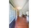 Inviting foyer showcasing hardwood floors and an open view into the adjacent dining area at 1050 Dunedin Trl, Woodstock, GA 30188