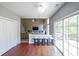 Open living space with view into the main living area, featuring hardwood floors and natural light at 1050 Dunedin Trl, Woodstock, GA 30188