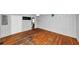 Bedroom with hardwood floors, white walls, ceiling fan, and closet for easy storage at 2194 Ivydale St, Atlanta, GA 30344