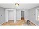 Bare bedroom showcasing neutral wall colors, closet, and unfinished floors ready for renovation at 2194 Ivydale St, Atlanta, GA 30344