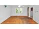 Bedroom with hardwood floors and a double window for natural light at 2194 Ivydale St, Atlanta, GA 30344