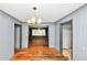 Dining room featuring wood floors, chandelier lighting and an open layout at 2194 Ivydale St, Atlanta, GA 30344