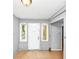 Entryway featuring tile flooring, neutral walls, and natural light streaming through the adjacent windows at 2194 Ivydale St, Atlanta, GA 30344