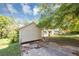 Side view of a residential home with ample outdoor space, showcasing its setting and structure at 2194 Ivydale St, Atlanta, GA 30344