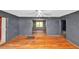 Spacious living room showcasing wood floors and an open layout to other rooms at 2194 Ivydale St, Atlanta, GA 30344