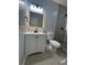 Stylish bathroom featuring a modern vanity, sleek fixtures, and a glass-enclosed shower at 4321 Austell Powder Springs Sw Rd, Powder Springs, GA 30127