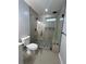 Modern bathroom design featuring a glass shower, sleek fixtures, and elegant tiling at 4321 Austell Powder Springs Sw Rd, Powder Springs, GA 30127