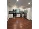 Modern kitchen featuring stainless steel appliances, white cabinets, and stylish backsplash at 4321 Austell Powder Springs Sw Rd, Powder Springs, GA 30127