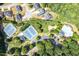 An aerial view showcasing the tennis courts, pool, and other amenities in this beautiful community at 6770 Ulster Ct, Alpharetta, GA 30005