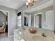 Bright bathroom featuring double sinks, a vanity, and a large mirror, for a modern and stylish space at 6770 Ulster Ct, Alpharetta, GA 30005