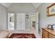 Spacious bedroom with walk-in closet, neutral walls, and access to an ensuite bathroom offers a relaxing retreat at 6770 Ulster Ct, Alpharetta, GA 30005