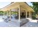 A covered picnic pavilion featuring tables and seating for residents at 6770 Ulster Ct, Alpharetta, GA 30005