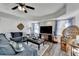 Bright living room featuring a comfortable sofa, and windows offers a perfect space to relax at 6770 Ulster Ct, Alpharetta, GA 30005