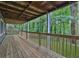 Wooden deck with view of green backyard at 9415 Martin Rd, Roswell, GA 30076