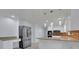 Well-equipped eat-in kitchen featuring stainless appliances, granite countertops, and ample cabinet space at 9415 Martin Rd, Roswell, GA 30076