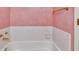 Bathroom showing the bathtub with gold fixtures at 2330 Burlington Ln, Snellville, GA 30078