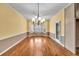 Bright dining area with hardwood floors and a chandelier at 2330 Burlington Ln, Snellville, GA 30078