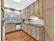 Traditional kitchen with wood floors, granite countertops, and white appliances at 2330 Burlington Ln, Snellville, GA 30078