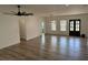 Spacious living room with wood floors and modern lighting at 4824 Highway 20 Se, Conyers, GA 30013