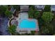 An aerial view of the community pool area with wading pool, pool house, and lounge chairs at 5450 Piney Grove Dr, Cumming, GA 30040
