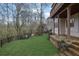 A beautiful backyard with well-maintained lawn and access to a deck, ideal for outdoor enjoyment at 5450 Piney Grove Dr, Cumming, GA 30040