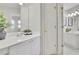 Bright bathroom featuring vanity, decor, and tile floors at 5450 Piney Grove Dr, Cumming, GA 30040