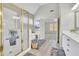 Luxurious bathroom with tub, shower, and double vanity at 5450 Piney Grove Dr, Cumming, GA 30040