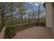 Scenic deck overlooking a wooded area, perfect for enjoying nature at 5450 Piney Grove Dr, Cumming, GA 30040