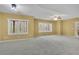 Expansive living room filled with natural light and neutral colors at 5450 Piney Grove Dr, Cumming, GA 30040