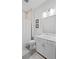 Clean bathroom featuring a vanity with white cabinets, a framed mirror, and a shower with a curtain at 756 Stickley Oak Way, Woodstock, GA 30189