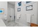 Well-lit bathroom featuring stylish decor, clean towels, and modern fixtures at 756 Stickley Oak Way, Woodstock, GA 30189