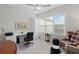 Bright office space with a large window providing plenty of natural light, complemented by neutral decor and carpeted floors at 756 Stickley Oak Way, Woodstock, GA 30189