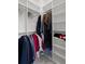 Organized walk-in closet with shelving and hanging rods for maximum storage and convenience at 756 Stickley Oak Way, Woodstock, GA 30189