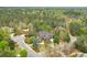 A stunning home with mature landscaping and a private, wooded setting at 800 Flathead Pass, Suwanee, GA 30024