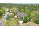 A gorgeous two-story home with a brick and stone facade and a meticulously landscaped yard at 800 Flathead Pass, Suwanee, GA 30024