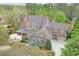 Charming two-story home with brick and stone facade, and a landscaped front yard at 800 Flathead Pass, Suwanee, GA 30024