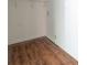 Compact closet space featuring simple shelving and modern flooring at 4704 Apache Sw Trl, Atlanta, GA 30331