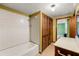 Functional bathroom with a shower-tub combination and built-in storage at 4980 W Chapel Hill Rd, Douglasville, GA 30135
