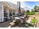 A beautiful outdoor patio with outdoor furniture that provides a great space for entertaining at 1545 Heatherton Rd, Dacula, GA 30019