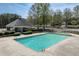 Community pool featuring comfortable seating, a pavilion, and recreational opportunities at 1545 Heatherton Rd, Dacula, GA 30019