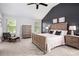 Serene main bedroom suite with a vaulted ceiling and elegant furnishings at 2240 Arnold Mill Nw Rd, Lawrenceville, GA 30044