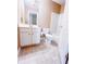 Bathroom with white vanity and mirror, toilet, and bathtub with shower at 3903 Cain Mill Dr, Lithonia, GA 30038