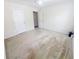Neutral bedroom with ceiling fan and two doors at 3903 Cain Mill Dr, Lithonia, GA 30038