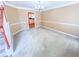 Inviting living room showcasing neutral paint and carpet, perfect for relaxing and entertaining at 3903 Cain Mill Dr, Lithonia, GA 30038