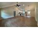 Spacious open-concept living area with vaulted ceilings and seamless flow into the kitchen at 482 West Ave, Bowdon, GA 30108