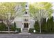 Attractive building exterior with trees, manicured shrubs, and Halten Hall entrance at , Atlanta, GA 30305