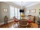 Cozy dining room area with hardwood floors and large windows for ample natural light at , Atlanta, GA 30305