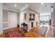 Inviting foyer with hardwood floors, a wine storage area, and access to the living spaces at , Atlanta, GA 30305